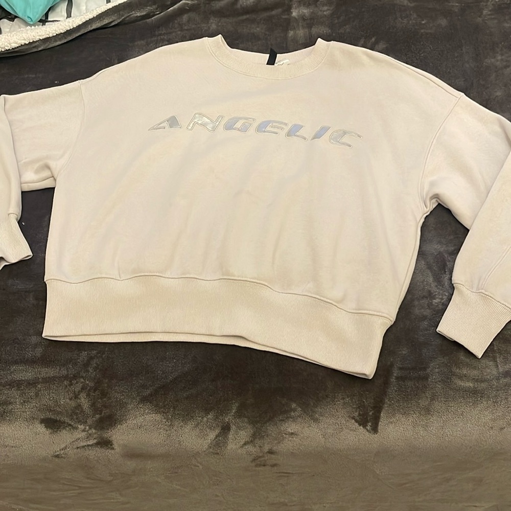 I have a size small cream sweater